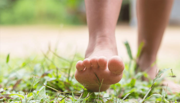 A representative image of a person walking barefoot.— Thecalmspace website/File