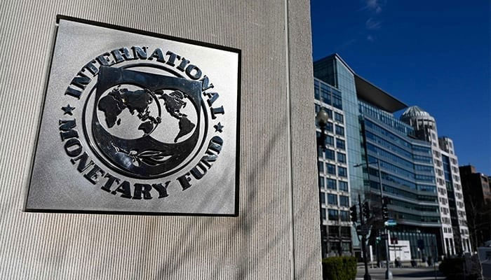 An image showing the seal for the International Monetary Fund (IMF) in Washington, DC on January 26, 2022,. — AFP