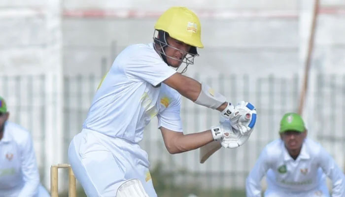 Peshawars Maaz Sadaqat plays a shot during Quaid-e-Azam Trophy triangular stage fixture against Lahore Whites on December 2, 2024. — PCB