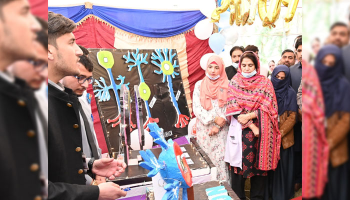 People visit a stall during an interactive anatomy exhibition organised by the KMU Institute of Nursing Sciences (INS), Peshawar on December 4, 2024. — Facebook@kmupeshawarofficial