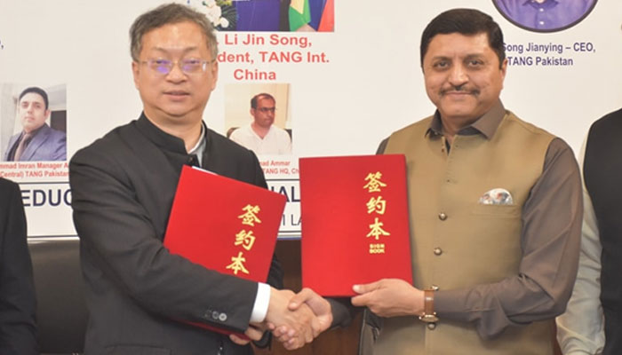 President of Tang International China Li Jin Song (left) and Tevta Chairman Brig (retd) Sajid Khokhar (right) shaking hands after signing an MOU at the Tevta Secretariat on December 6, 2024. — Facebook@tevtianpunjab
