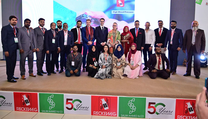 CEO of Dr Reckeweg Germany Dr David Reckeweg (8th left) in a group photo with others at the Golden Jubilee event of Dr Reckeweg Germany on December 3, 2024. — Facebook@Dr.Reckeweg.pk