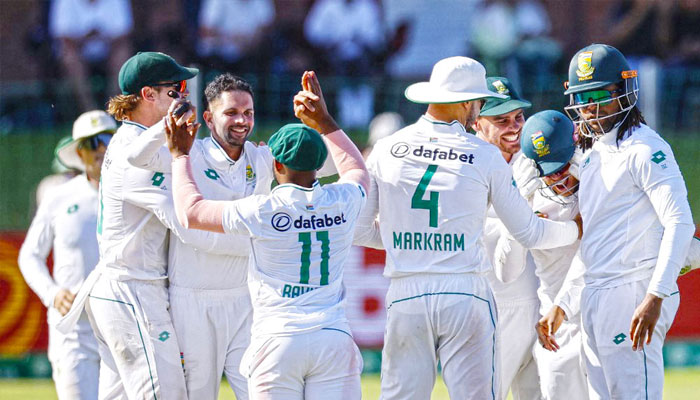 South African players celebrate the wicket of Sri Lanka’s Kamindu Mendis on the fourth day of their second Test at St Georges Park in Gqeberha on Sunday December 8, 2024. — AFP