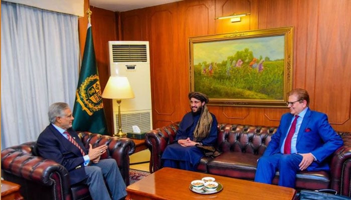 (From left) Deputy Prime Minister/Foreign Minister Senator Mohammad Ishaq Dar, Afghan Chargé d’affaires Sardar Ahmad Shakeeb and the newly appointed Special Representative for Afghanistan Ambassador (R) Mohammad Sadiq in meeting at the Foreign Office on Dcember 9, 2024. — APP