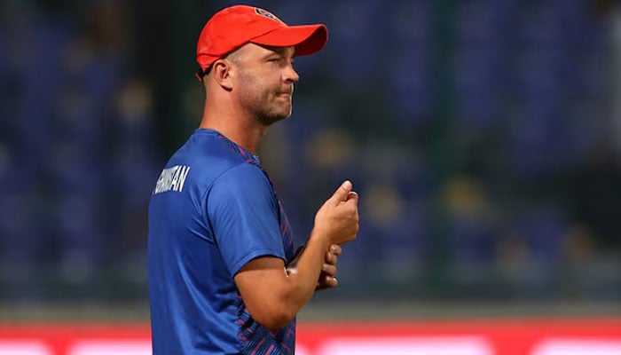 Afghanistan coach Jonathan Trott celebrates after the match. — Reuters/File