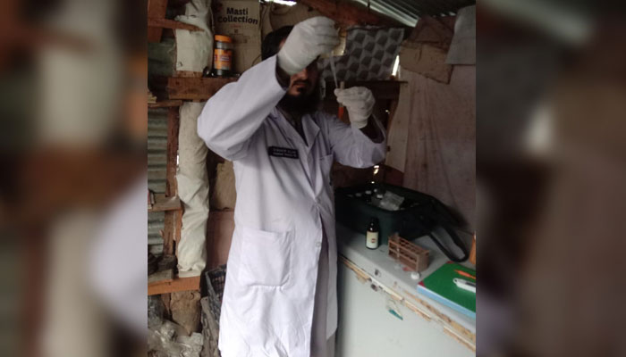 Representational image shows an official of KP Food Safety and Halal Food Authority testing and checking cooking oil, this image released on September 11, 2024. — Facebook@KPFoodAuthority