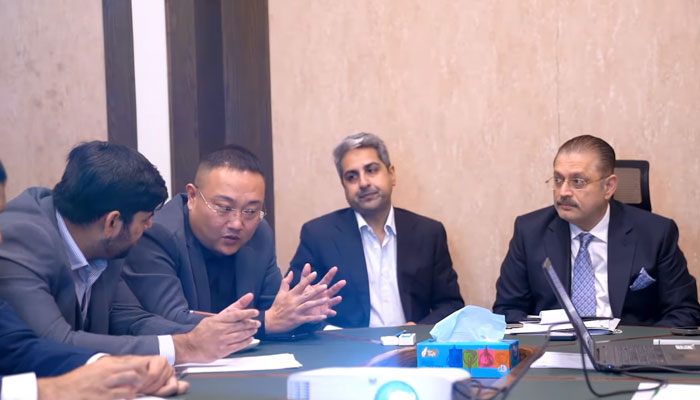 Sindh Senior Minister for Information and Transport Sharjeel Inam Memon (right) in a meeting with a delegation of foreign investors in Karachi on December 10, 2024. — Screengrab via Facebook@SharjeelInamMemon63