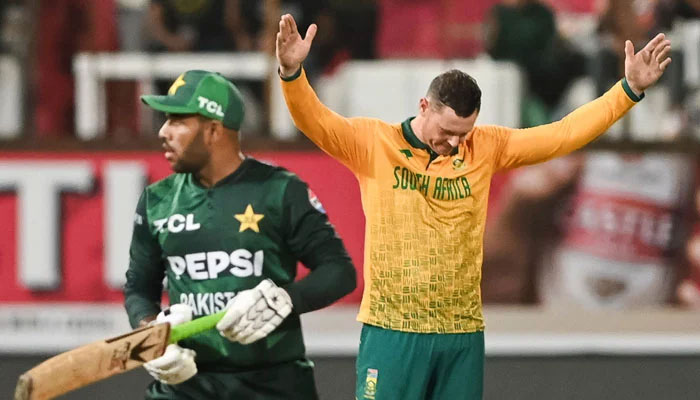 South Africas George Linde (right) celebrates taking a wicket of Pakistans Usman Khan during the first T20I on December 10, 2024. — X/ProteasMenCSA