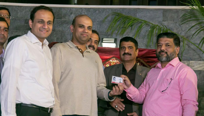 Karachi Mayor Barrister Murtaza Wahab (left) poses for a photo with the KPC members during the inauguration of the newly constructed lawn at the Karachi Press Club on December 12, 2024. — Facebook@barristermurtazawahabofficial