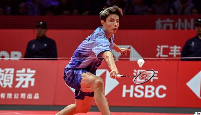 Chinas Shi Yuqi hits a return to Denmarks Anders Antonsen during the mens singles final match at the BWF Badminton World Tour Finals in Hangzhou, on Dec 15, 2024.— AFP