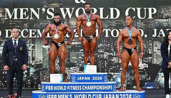 Pakistans top bodybuilder Zahid Mughal (second left) on the silver medal podium at the 2024 IFBB World Fitness Championships & Men’s World Cup in Japan.— IFBB website/File