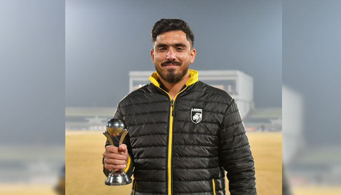Afaq Afridi of Nurpur Lions with a trophy.— Instagram@championscuppcb/File