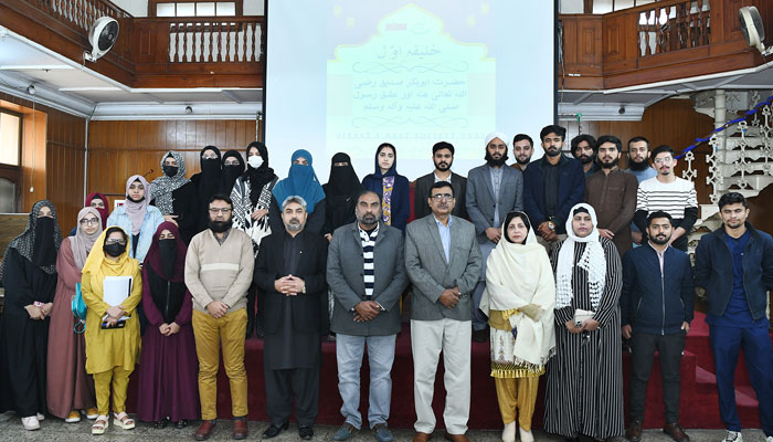 Participants pose for a group photo during a seminar to pay rich tribute to the services and contributions of Hazrat Abu Bakar Siddique (RA) at UVAS City Campus on December 20, 2024. — Facebook@UVAS.Pakistan