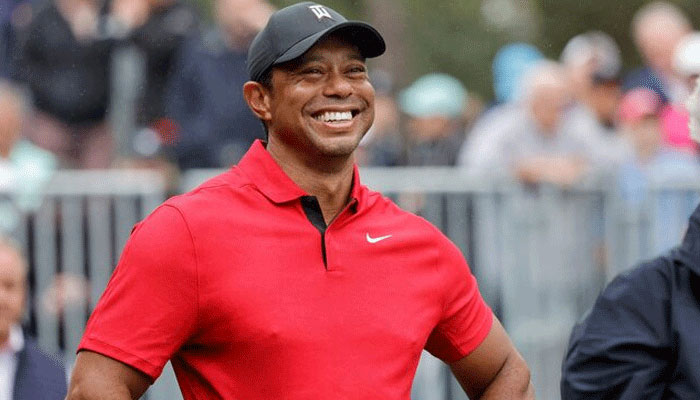 Tiger Woods walks 18 holes in PNC Championship pro-am