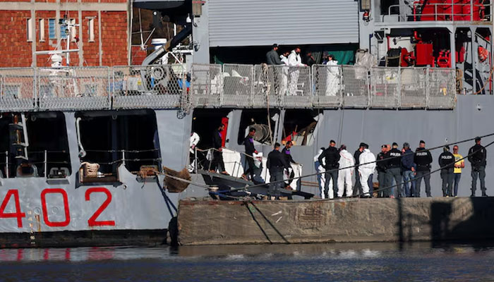 Migrants disembark from the Italian navy ship Libra carrying migrants that arrived in Albania as part of a deal with Italy to process thousands of asylum-seekers caught near Italian waters, in Shengjin, Albania, November 8, 2024. — Reuters