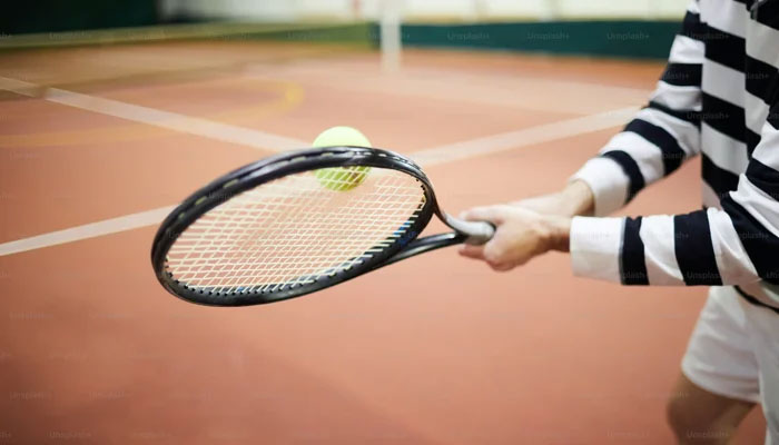 This image shows a person taking a shot. — Unsplash/File