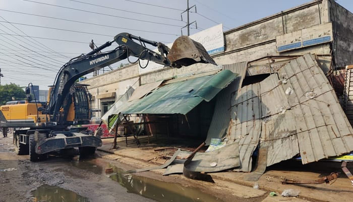 Lahore Development Authority machinery removing the illegal installations in the city in this picture released on September 21, 2023. — Facebook/Lahore Development Authority