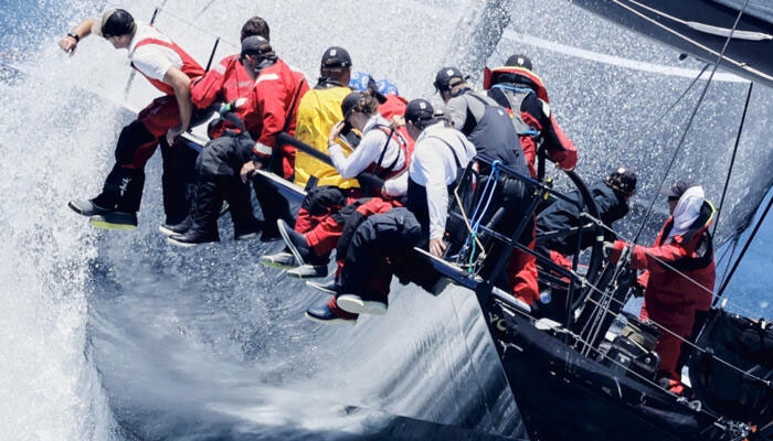 People seen jumping of a rocking yatch in this image.— AFP/File