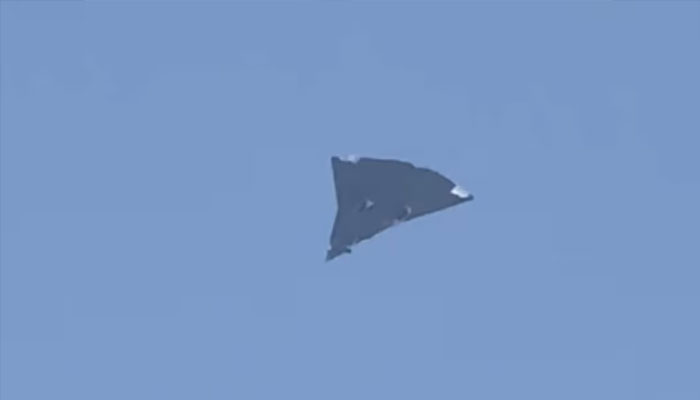 A Chinese military aircraft flies in Chengdu, Sichuan, China, in this screengrab taken from a social media video released on December 26, 2024. — Reuters