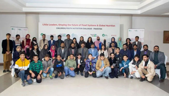 The image shows a group photo on the occasion of “Little Leaders, Big Impact – Children/Youth Nutrition Dialogue held by the Global Alliance for Improved Nutrition and National Alliance for Safe Food on Dec 27, 2024. — APP/File