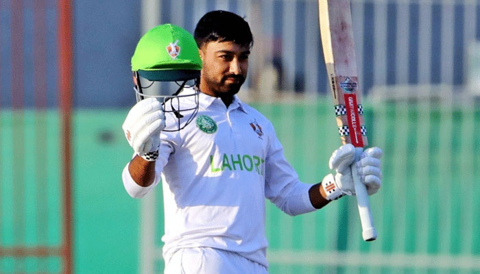 Ali Zaryab celebrating after century in Quaid-e-Azam trophy match against Sialkot at National Bank stadium on December 29, 2024. —PCB