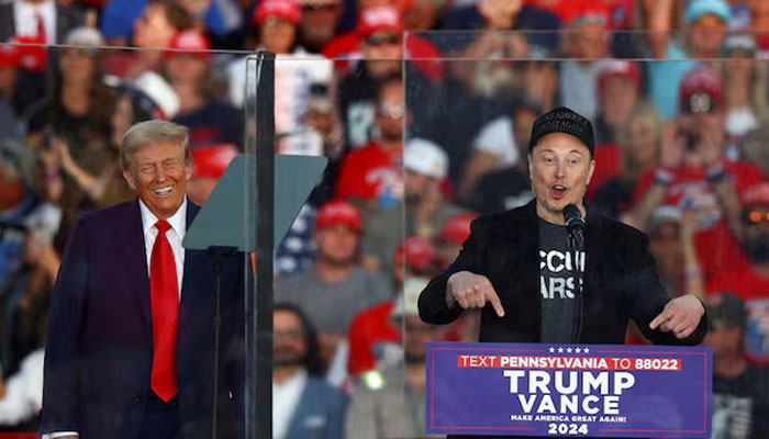 Tesla CEO and X owner Elon Musk (right) speaks as US president-elect Donald Trump reacts during a rally. — Reuters/File