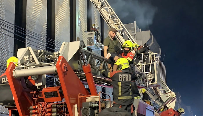 Fire workers busy in rescue operation on the site of incident in Bangkok. — X@rapid_raveal/File