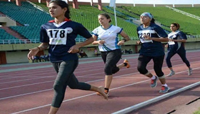 An undated picture of Pakistani female athletes running on a track. — Athletics Federation of Pakistan website/File