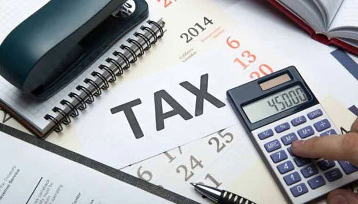 The representational image shows a man doing calculation. — APP/File