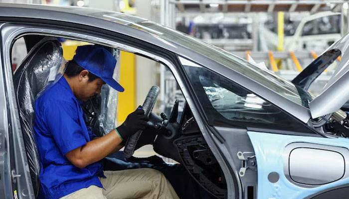 A worker assembles an EV car inside BYDs first electric vehicle (EV) factory in Southeast Asia, a fast-growing regional EV market where it has become the dominant player, in Rayong, Thailand, July 4, 2024. — Reuters