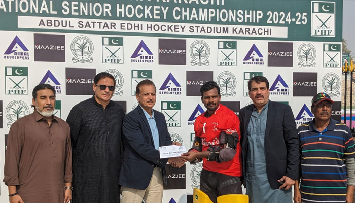 The image shows a glimpse of award ceremony during the DHA 68th National Senior Hockey Championship— Facebook@asiahockey/
