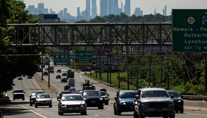 Cars drive along a highway during the Memorial Day weekend while the New York Skyline and the Empire State Building are seen in the background in Clifton, New Jersey, US May 24, 2024. — Reuters