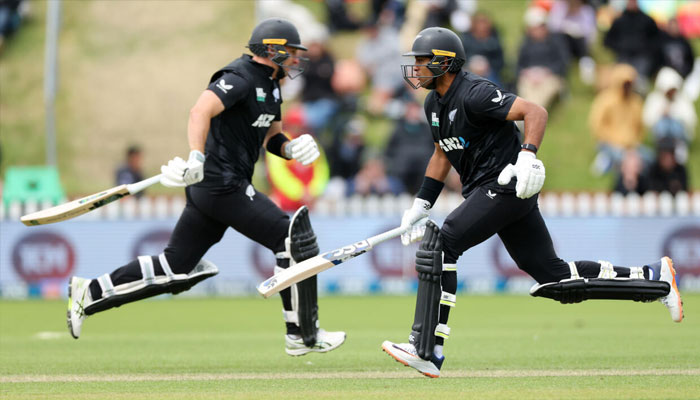 New Zealand batters Rachin Ravindra (right) and Will Young seen running. — AFP/File
