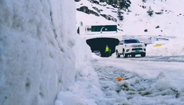 This image shows vehicles passing through the Lowari Tunnel February 20, 2024. — Facebook@LowariTunnelOperationandWeatherUpdates