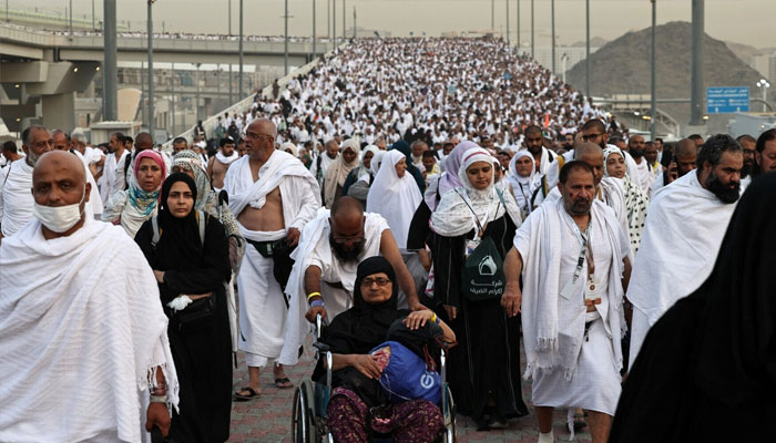 Muslim pilgrims arrive to perform the symbolic stoning of the devil ritual as part of the haj pilgrimage in Mina, near Makkah, on June 16, 2024. — AFP