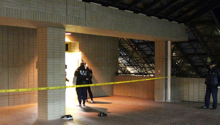Police officers are pictured at the scene after a woman brandished a hammer inside a classroom at Hosei University’s Tama campus in Machida in the western suburbs of Tokyo on January 10, 2025. — AFP