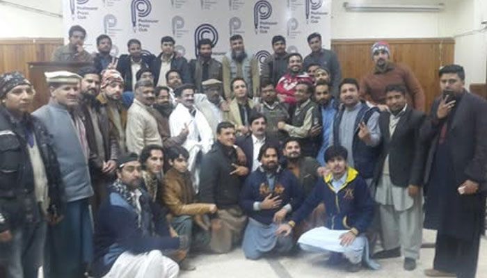 Member of the Video Journalists Forum taking a group photo.— Facebook@VJFPeshawar/File