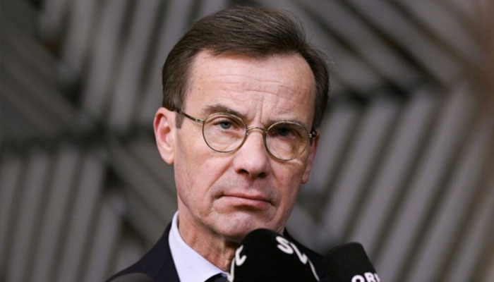 Swedish Prime Minister Ulf Kristersson speaks to the press prior to an European Council meeting at the EU headquarters in Brussels on December 19, 2024. —AFP