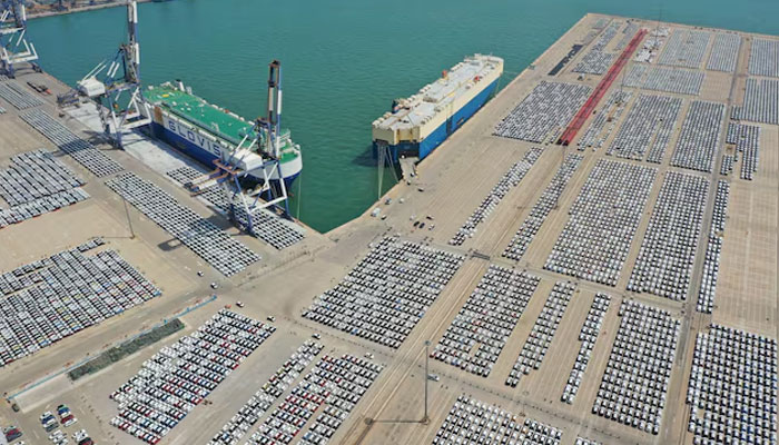 An aerial view shows cars for export at a port in Yantai, Shandong province, China May 3, 2023.— Reuters
