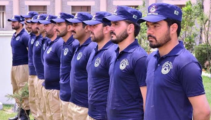 In this image, the Tourism Police personnel stand alert. — X@KPKUpdates/File