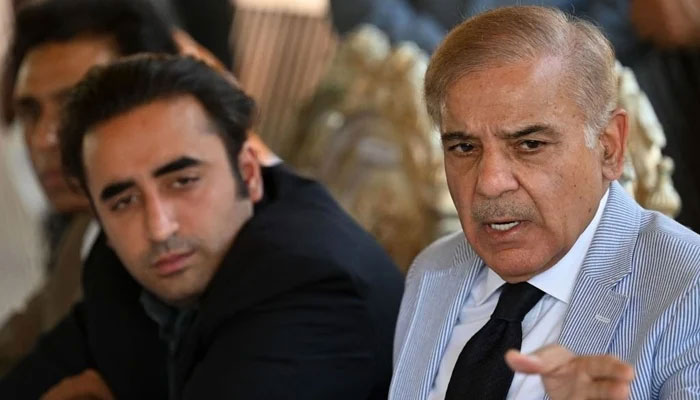 Prime Minister Shehbaz Sharif speaks as PPP Chairman Bilawal Bhutto-Zardari looks on in this undated image. — AFP/File