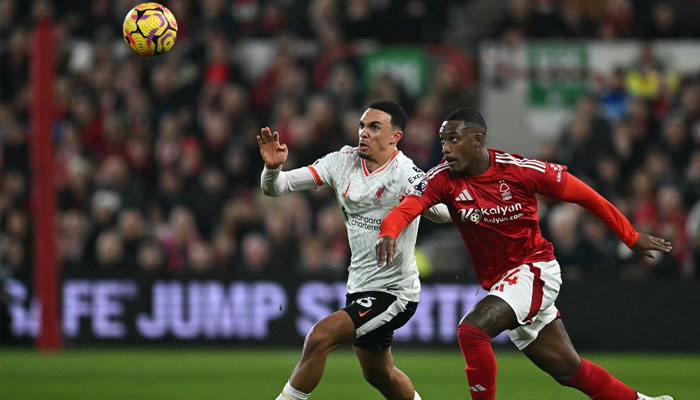 Hudson-Odoi and Alexander-Arnold battle during the game. —AFP/File