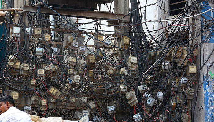 Electricity meters under a transformer in Faisalabad, on September 10, 2023. — APP