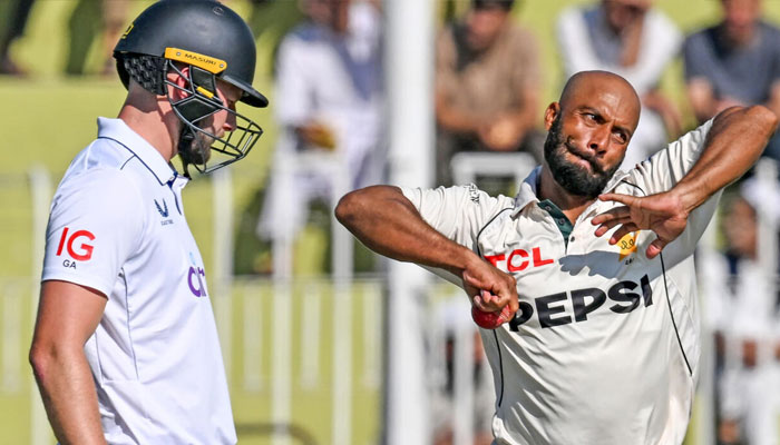 Pakistans Sajid Khan (right) can be seen bowling. —AFP/File