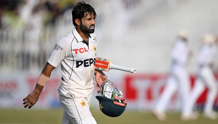 Mohammad Rizwan walks back to the pavilion at the end of first innings of first Test cricket match between Pakistan and Bangladesh at the Rawalpindi Cricket Stadium in Rawalpindi on August 22, 2024. — AFP