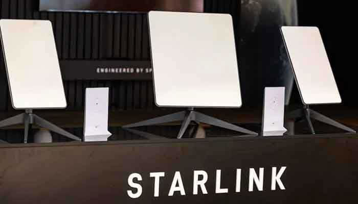A representational image showing Starlink logo at the companys stall during an exhibition. — AFP/File