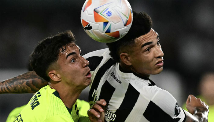 New Manchester City recruit Vitor Reis (left), in action for Palmeiras. —AFP/File