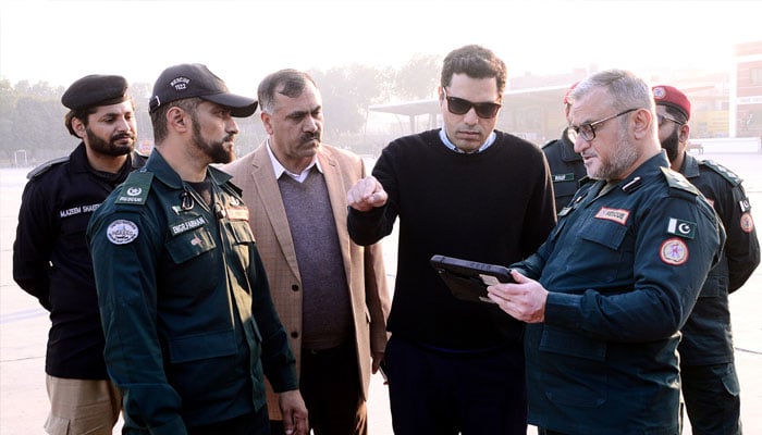 EPA DG Dr Imran Hamid Sheikh (centre) seen amid a visit.— Facebook@punjabepa/File