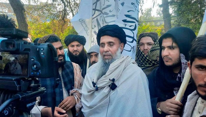 Afghan fighter Khan Mohammad (centre) who was imprisoned in America, speaks to the media as he arrived in Jalalabad after he was released in exchange for American citizens — AFP/File