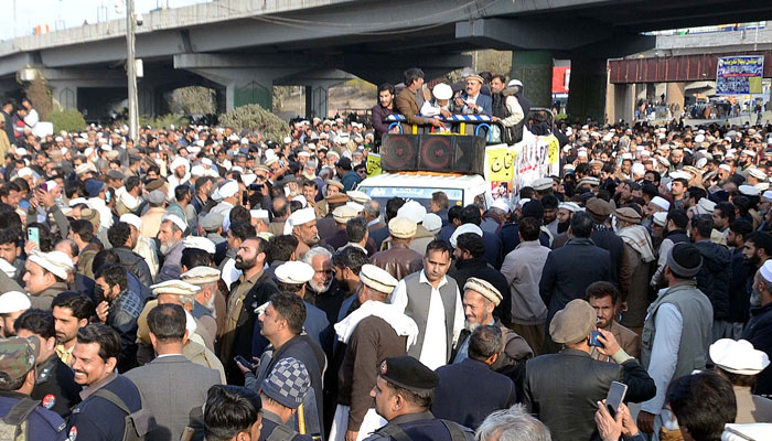 Government employees block a road as they are holding a protest demonstration for acceptance of their demands outside the Provincial Assembly building in Peshawar on January 22, 2025. — PPI